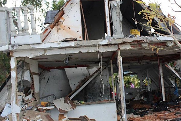 The Junquito cabin showing RPG and war weapon damage